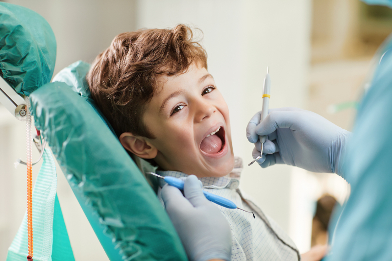 Signs That Your Child Needs to See a Dentist for Kids